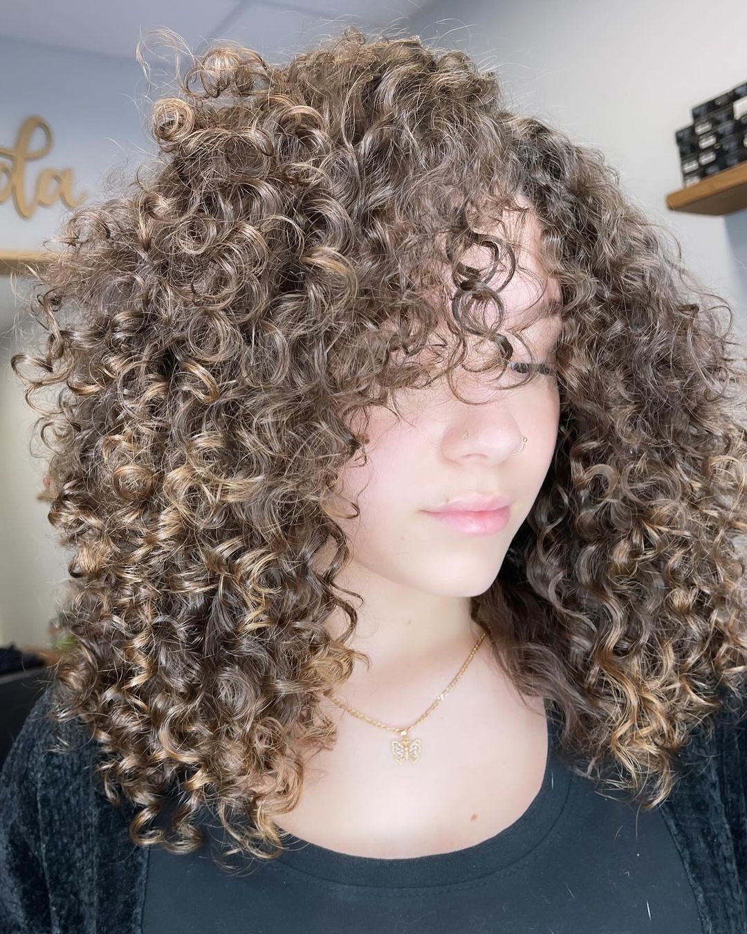 medium length layered curly hair