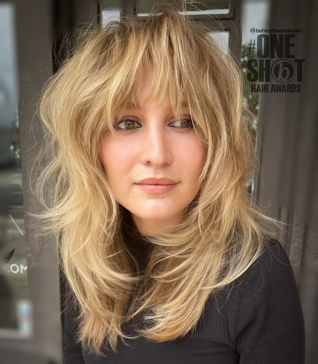 layered medium length tousled haircut