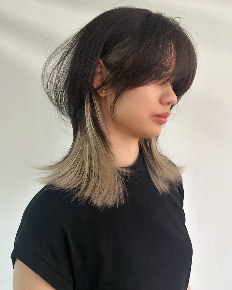 medium layered hair with peekaboo